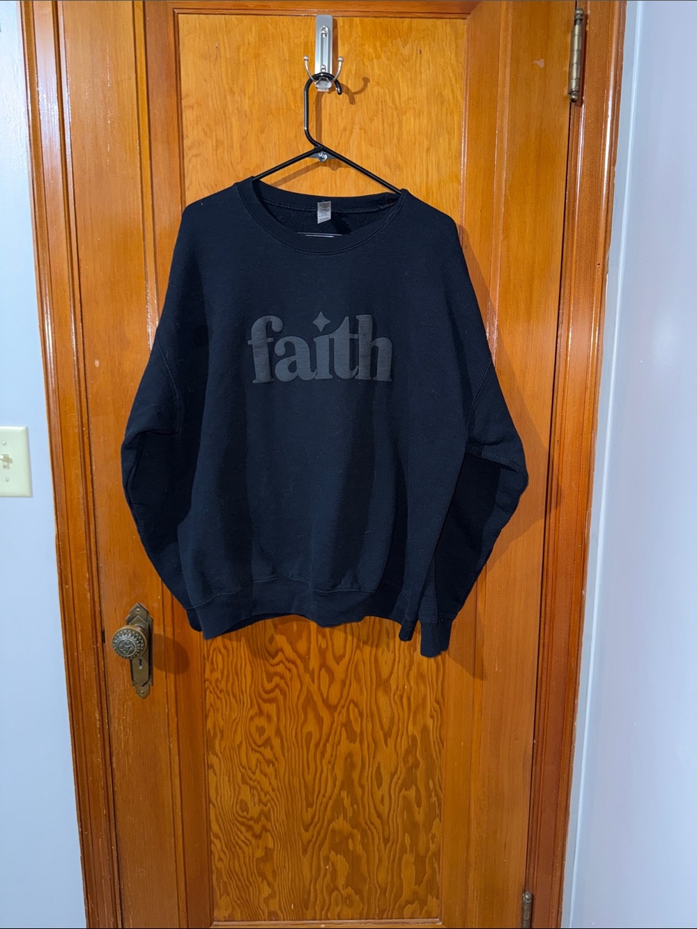 Gildan Black Crewneck Sweatshirt with 'faith' Raised Logo